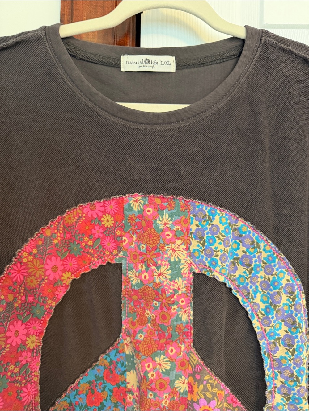 NATURAL LIFE Black Short Sleeve T-shirt dress with Multicolor Floral Peace Sign